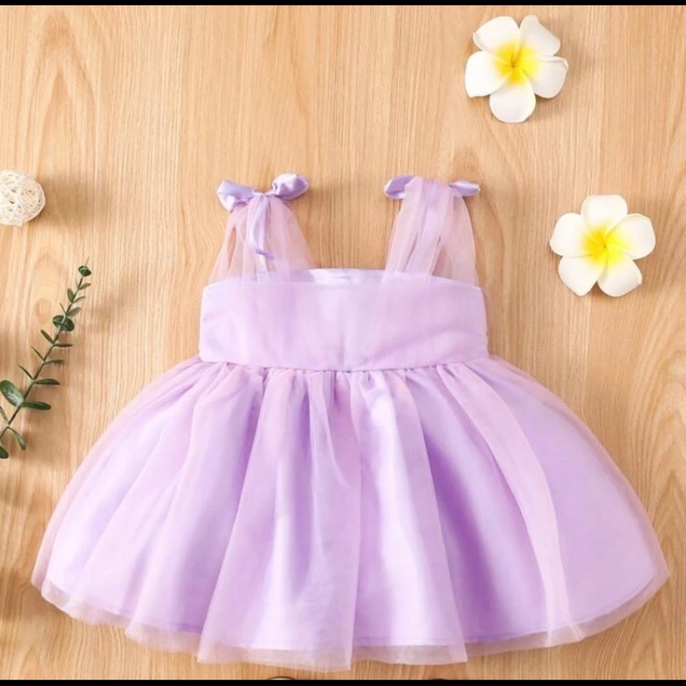 Baby girl whimsical mesh dress. Color is lilac. Never worn. Size:6-9 months